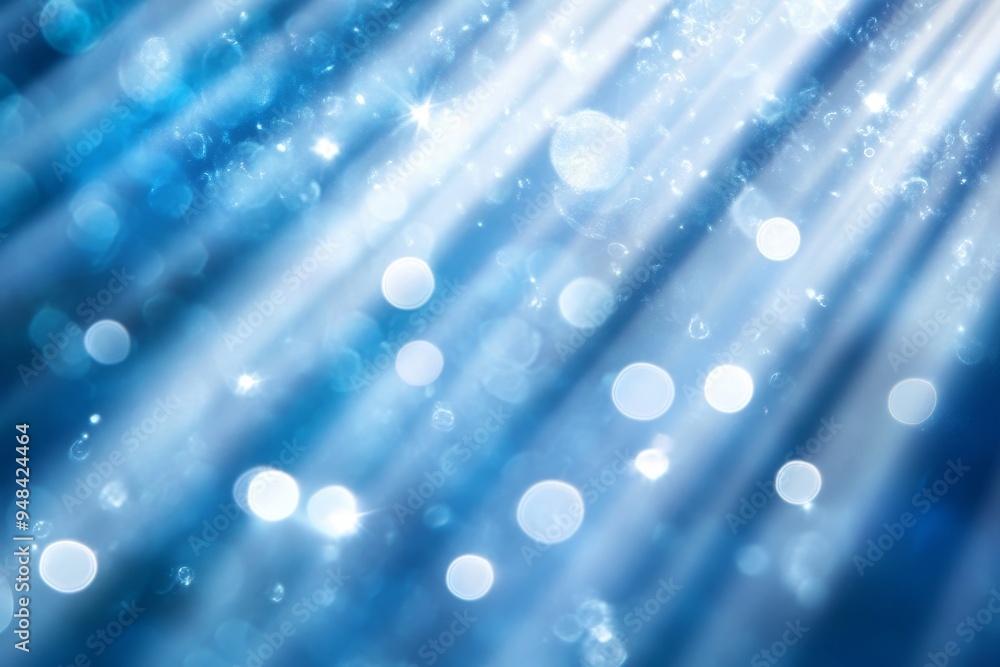 Poster abstract blue bokeh background with light rays and glitter