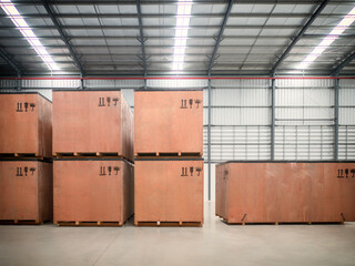 Project cargo in big wooden boxes stored in the warehouse.