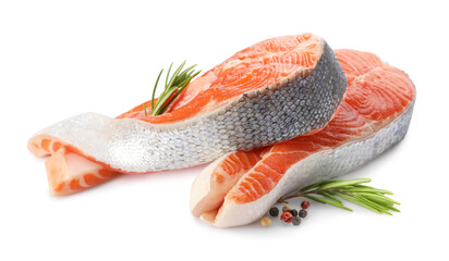 Two fresh salmon steaks, peppercorns and rosemary isolated on white