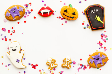 Funny Halloween gingerbread biscuits, homemade cookies, top view