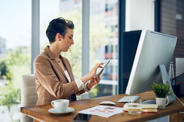 Woman, tablet and typing in office for business, agenda and app for schedule in city. Receptionist,...