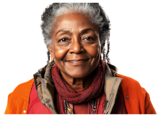 Portrait of an elderly woman with gray hair wearing an orange jacket, red scarf, and neutral-colored inner layers, smiling at the camera against a white background.