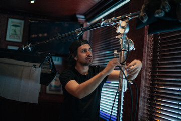 Illuminators with lighting equipment, lighting devices on the set.