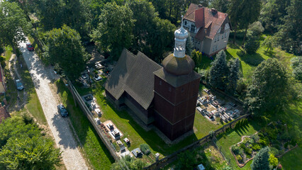 Naklejka premium Church of St. Michael the Archangel in Michalice - Trail of wooden sacral architecture of the Opole voivodeship