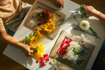 Children make cards with flowers for mom, holiday concert