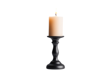 Elegant candle lit on a black candlestick