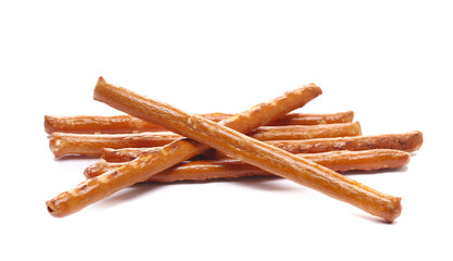 Salty cracker pretzel sticks, stuffed with peanuts, crumbs isolated on white