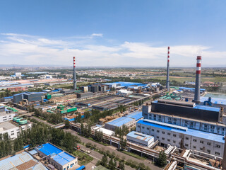 view of power station in blue sky