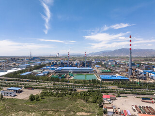 view of power station in blue sky