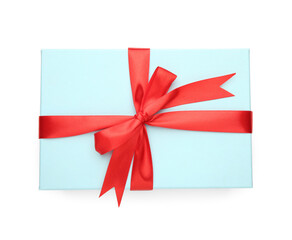 Gift box with red satin bow isolated on white, top view