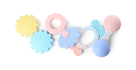 Colorful rattles isolated on white, top view. Baby accessories