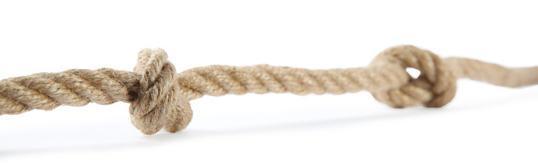 Hemp rope with knots isolated on white