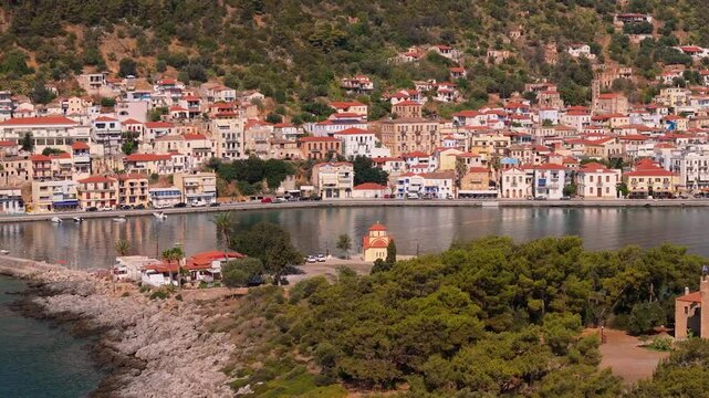 greece peloponnese region gytheio town lighthouse coastal houses chapel and boats aerial view 4k footage