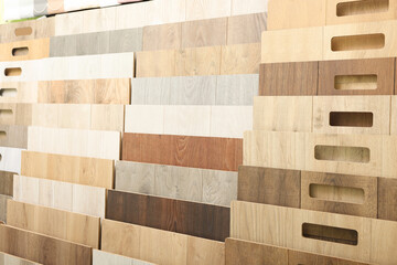 Many different samples of wooden flooring in store, closeup