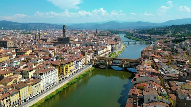 An aerial view of Florence, Italy, captured by a drone, highlighting the city's stunning Renaissance architecture and iconic landmarks. Florence, the cradle of the Renaissance, is renowned for it