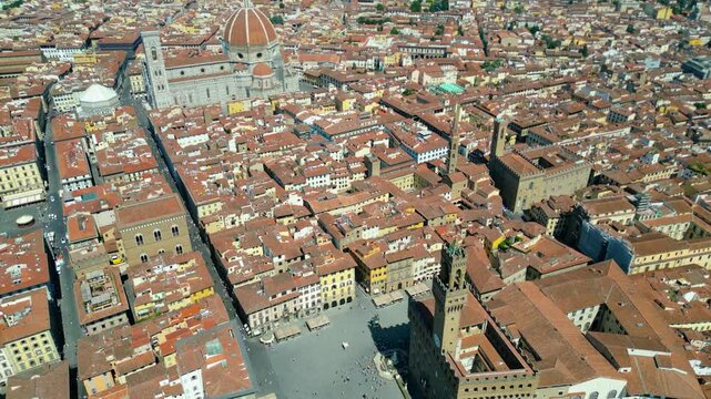 An aerial view of Florence, Italy, captured by a drone, highlighting the city's stunning Renaissance architecture and iconic landmarks. Florence, the cradle of the Renaissance, is renowned for it