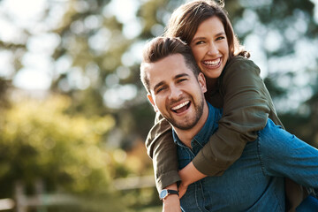 Portrait, smile and couple with piggyback outdoor for summer holiday, marriage support and...