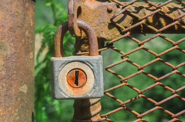 Old Rusty Lock on Fence