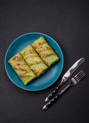 Spinach Crepes stuffed with chicken, mushrooms, salt and spices