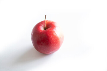 red fresh apple on a white background