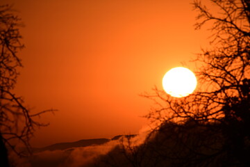 Naklejka premium sunset in the mountains