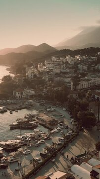 Aerial sunset shot of the town of Kas in Turkey, vertical video