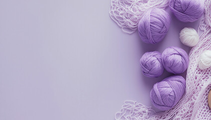 A serene image featuring purple yarn balls arranged on a pastel lavender background with a crochet net. Perfect for crafting, knitting, and textile design themes.