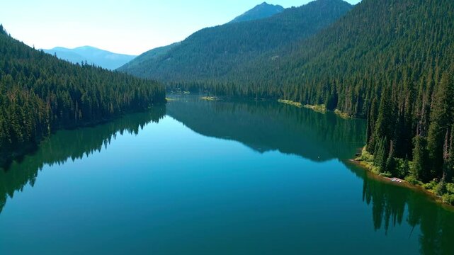 Nature landscape. Cooper Lake in Central Washington Cascade Mountains. Scenic nature of hiking Cooper lake. Cooper lake with mountain landscape. Landscape of Cooper lake mountain. Panoramic shot
