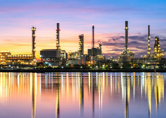 Naklejka premium oil and gas refinery background, Business petrochemical industrial, Refinery oil and gas factory power and fuel energy, Ecosystem estates. Fuel refinery industry at night