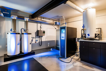a hydrogen fuel cell in a home's basement, connected to the main pipeline, demonstrating how hydrogen is converted into electricity for household use