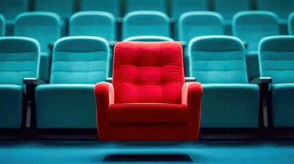 Fototapeta premium Floating Red Armchair in a Theater with Blue Seats