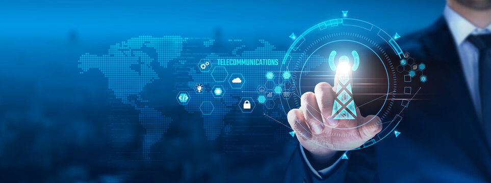 Telecommunications concept: Businessman touching communication icon on virtual interface, connectivity, data transmission, network infrastructure, innovation.