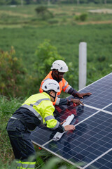 Service engineer inspects and maintains solar panels in a cultivation area, promoting clean energy.
