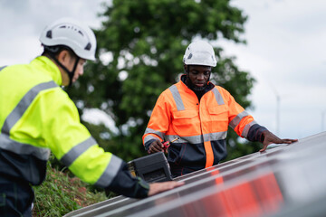 Service engineer inspects and maintains solar panels in a cultivation area, promoting clean energy.