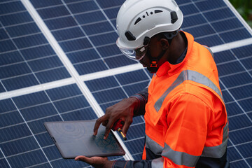 Service engineer inspects and maintains solar panels in a cultivation area, promoting clean energy.