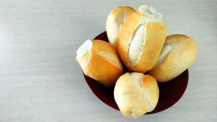 Some French Bread Dinner Rolls on the bowl with copy space.
