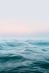 Obraz premium Crystal clear sea water at sunset.