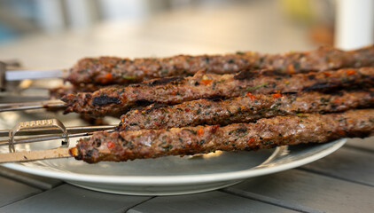 Freshly grilled spicy meat skewers.