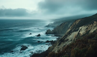 Overcast sky stretching endlessly above a rocky coastline