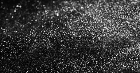 Obraz premium Textured Gray Glitter Background with Grainy Black and White Noise for Graphic Designs and Wallpapers