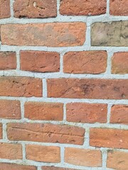 Obraz premium minimalistisches Hintergrundbild - Nahaufnahme einer Backsteinmauer in Neustrelitz, Mecklenburg - Vorpommern