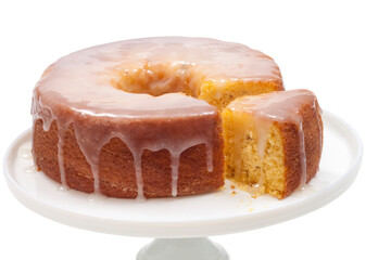orange cake with sugar syrup on a neutral background