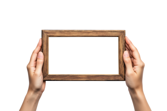 Hands holding wooden frame isolated on a transparent background. PNG file.