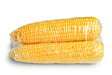 Corn in plastic food wrap on white background
