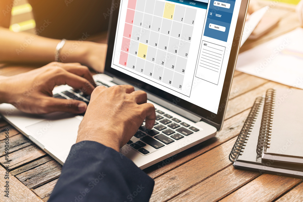 Poster calendar on computer software application for modish schedule planning for personal organizer and on