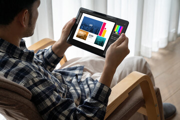 Graphic designer software for modern design of web page and commercial ads showing on the computer screen