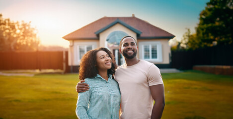 Man and woman dream of buying new house, happy family stands in front of their new home, estate purchasing