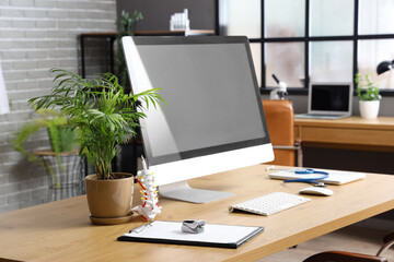 Modern workplace of doctor with computer in clinic