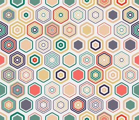 Honeycomb mosaic background. Geometric shapes of varied style and color. Honeycomb cells. Tileable pattern. Seamless background. Symmetrical vector illustration.