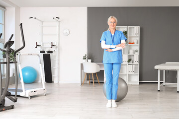 Portrait of female physiotherapist in rehabilitation center